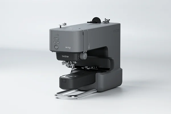 De kleinste borduurmachine met vrije arm, de Skitch PP1 van Brother.